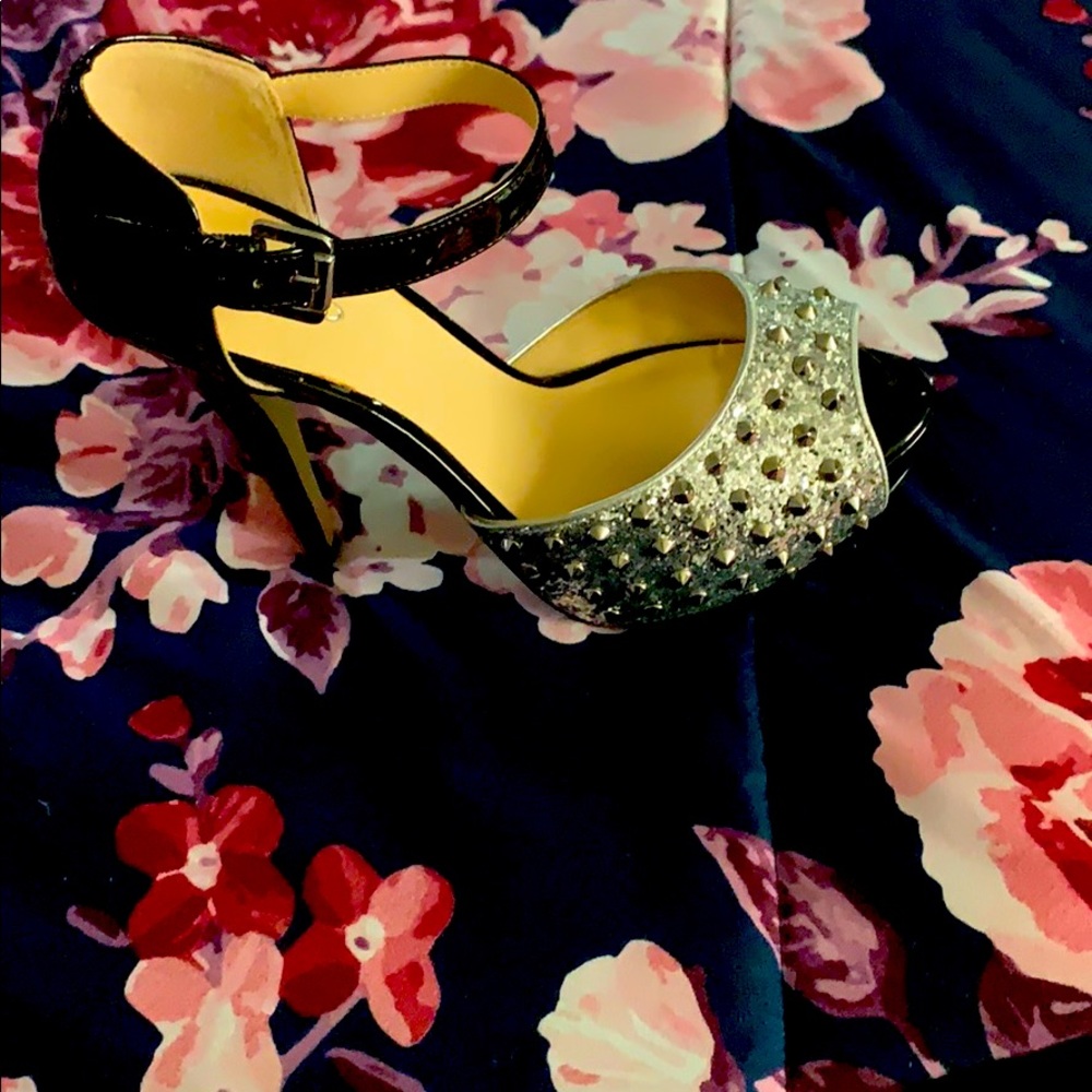 Platform heel with silver spikes on front